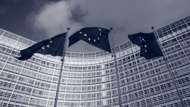 European Union flags outside the European Commission in Brussels